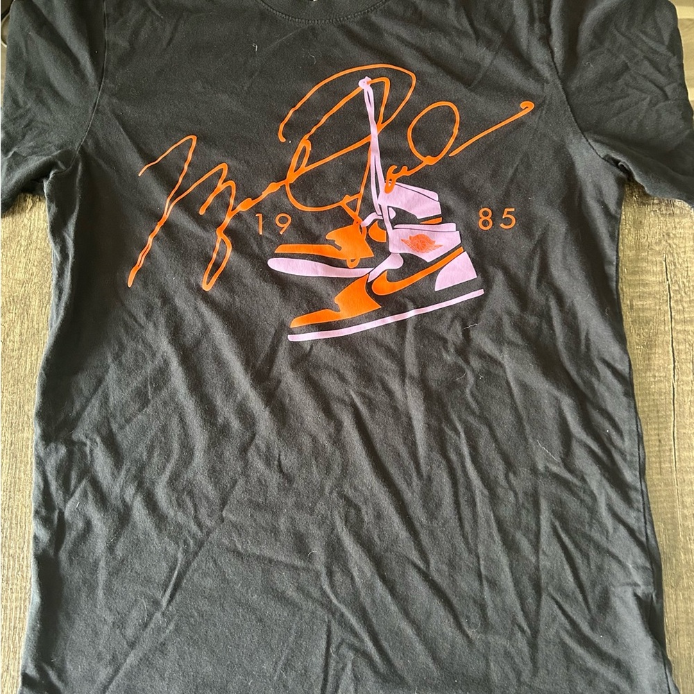 Black Graphic Tee with Orange Design